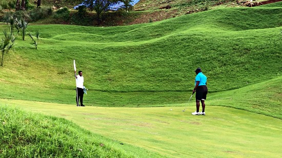 On the green at Black Iguana Roatan Honduras.